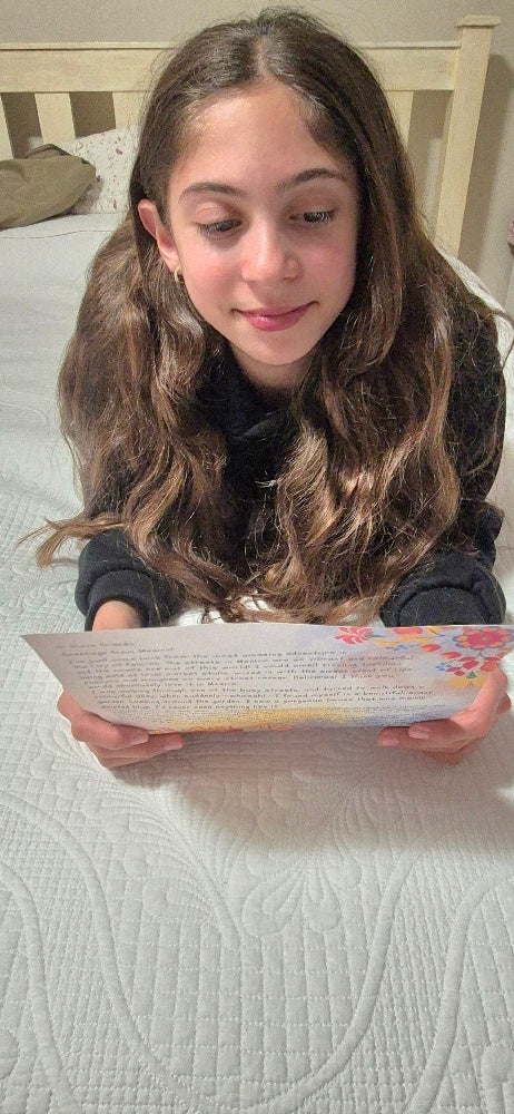 child reading a lilys adventure letter