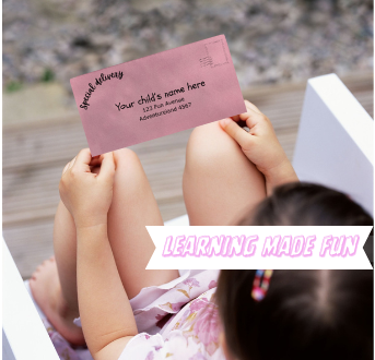child holding a lilys adventure letter in her hand